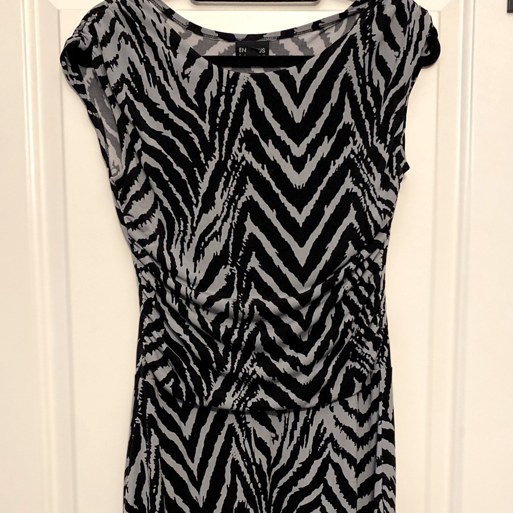 Look amazing in this black/gray animal print dress size 8
